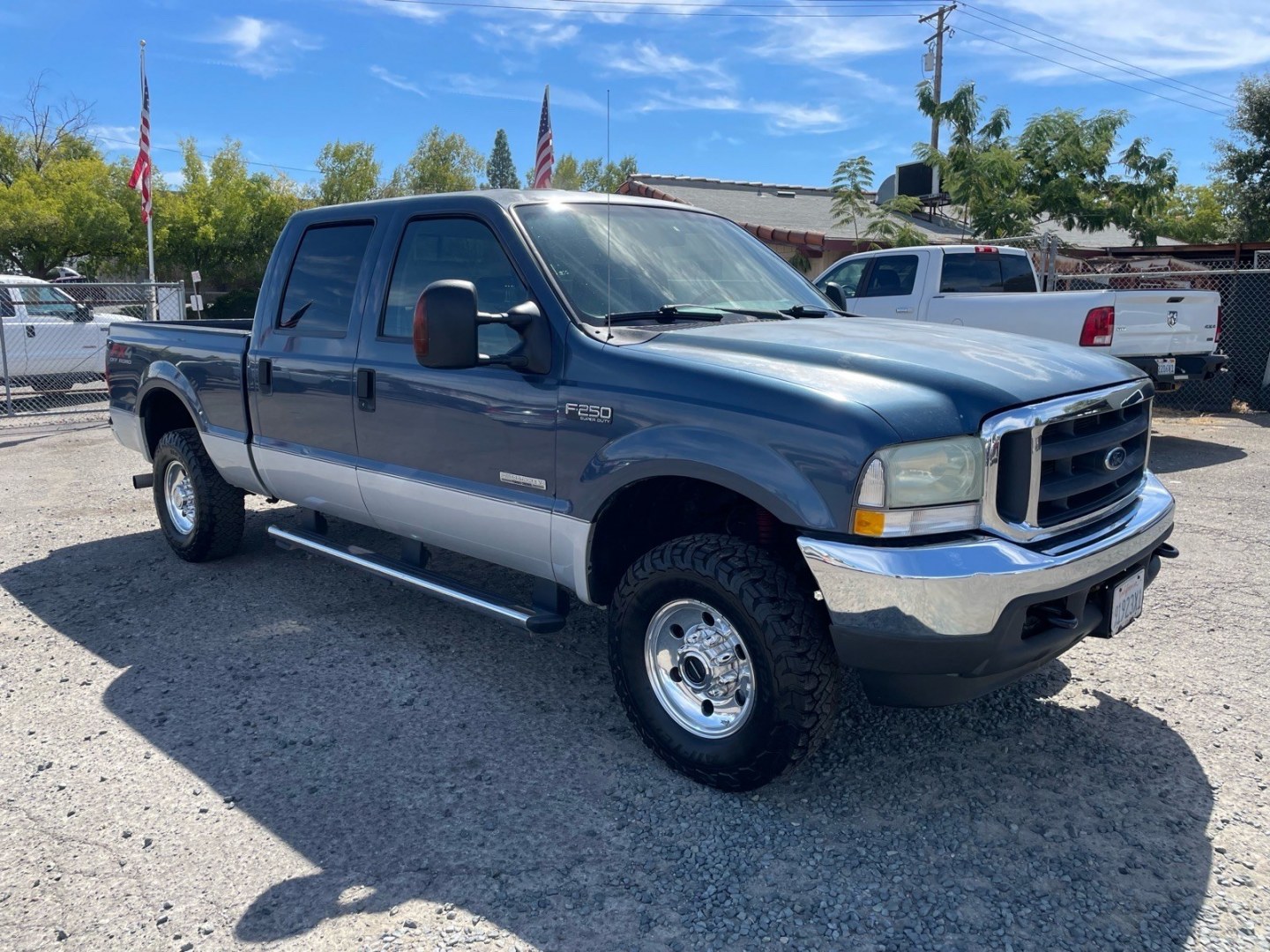 2004 Medium Wedgewood Blue Clearcoat Ford F-250 Super Duty XLT (1FTNW21P44E) with an Power Stroke 6.0L Diesel Turbo V8 325hp 560ft. lbs. Other engine, 5-Speed Automatic transmission, located at 800 Riverside Ave, Roseville, CA, 95678, (916) 773-4549, 38.732265, -121.291039 - DIESEL CREW CAB 4X4 FX4 XLT CLEAN CARFAX- Photo#1