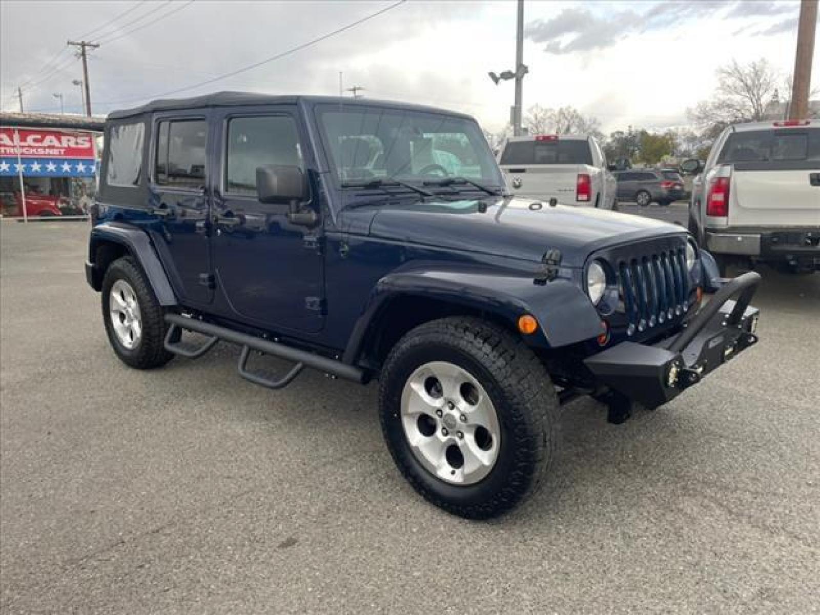 2013 True Blue Pearl Coat Jeep Wrangler Unlimited Sahara (1C4BJWEG7DL) with an 3.6L 3.6L V6 285hp 260ft. lbs. Sequential Multiport Fuel Injection engine, 5-Speed Automatic transmission, located at 800 Riverside Ave, Roseville, CA, 95678, (916) 773-4549, 38.732265, -121.291039 - 4X4 UMLIMITED SAHARA NEW SOFT TOP NEW TIRES - Photo #1