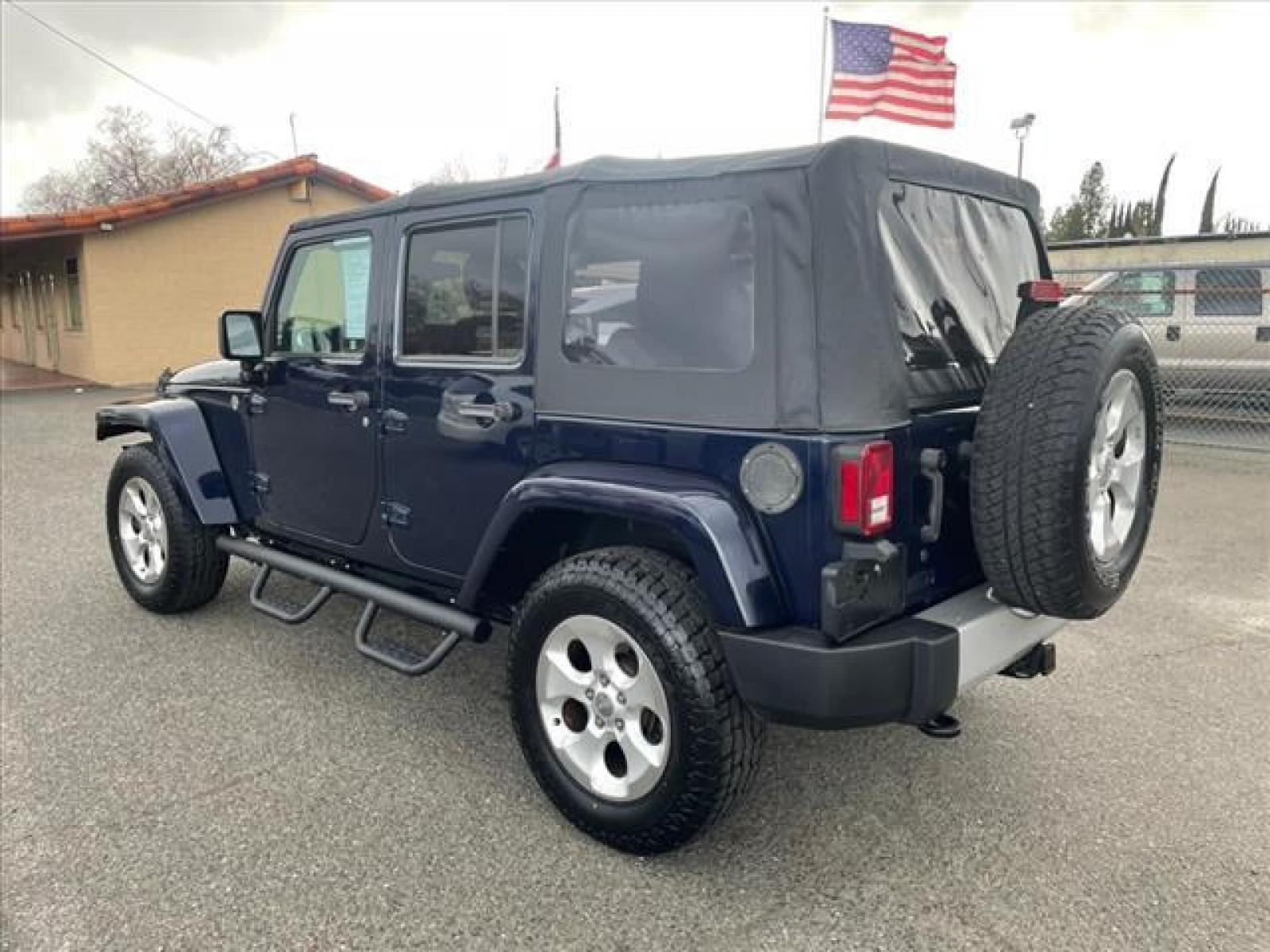 2013 True Blue Pearl Coat Jeep Wrangler Unlimited Sahara (1C4BJWEG7DL) with an 3.6L 3.6L V6 285hp 260ft. lbs. Sequential Multiport Fuel Injection engine, 5-Speed Automatic transmission, located at 800 Riverside Ave, Roseville, CA, 95678, (916) 773-4549, 38.732265, -121.291039 - Photo #2