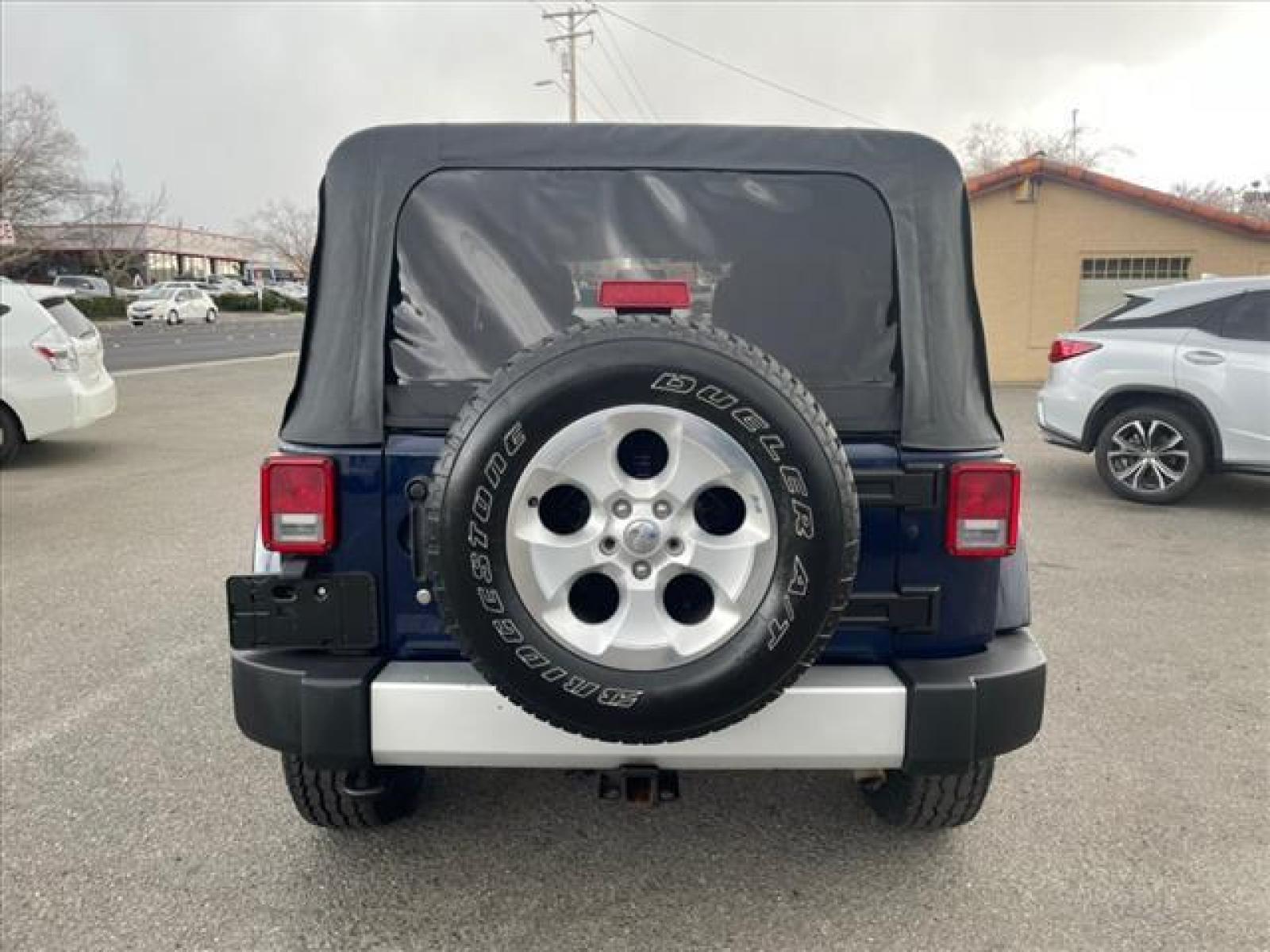 2013 True Blue Pearl Coat Jeep Wrangler Unlimited Sahara (1C4BJWEG7DL) with an 3.6L 3.6L V6 285hp 260ft. lbs. Sequential Multiport Fuel Injection engine, 5-Speed Automatic transmission, located at 800 Riverside Ave, Roseville, CA, 95678, (916) 773-4549, 38.732265, -121.291039 - 4X4 UMLIMITED SAHARA NEW SOFT TOP NEW TIRES - Photo #8