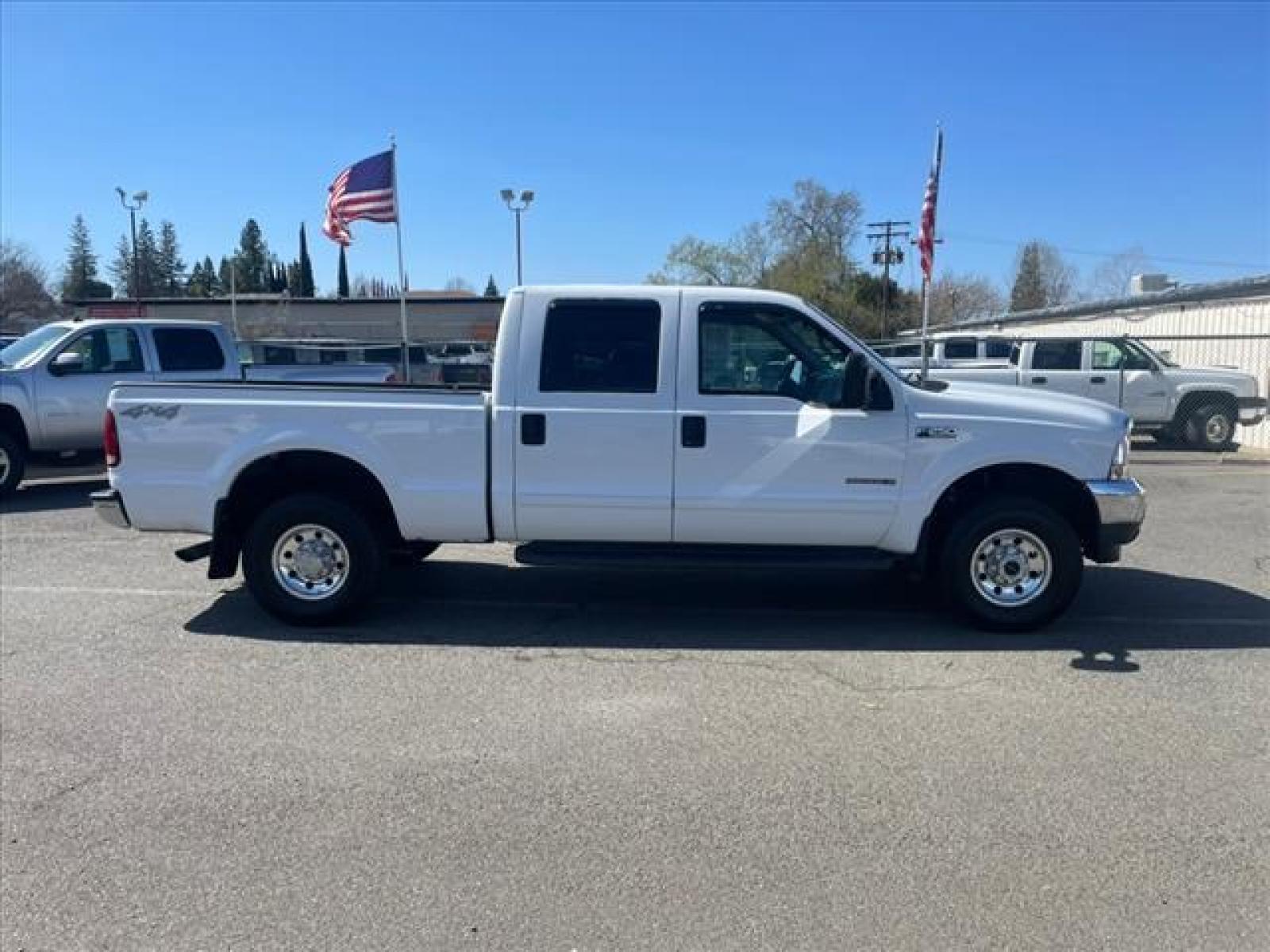 2002 Oxford White Clearcoat Ford F-250 Super Duty XLT (1FTNW21F22E) with an 7.3L Power Stroke 7.3L Diesel Direct Injection engine, 4-Speed Automatic transmission, located at 800 Riverside Ave, Roseville, CA, 95678, (916) 773-4549, 38.732265, -121.291039 - 7.3 DIESEL CREW CAB 4X4 XLT NEW TIRES CLEAN CARFAX - Photo #5
