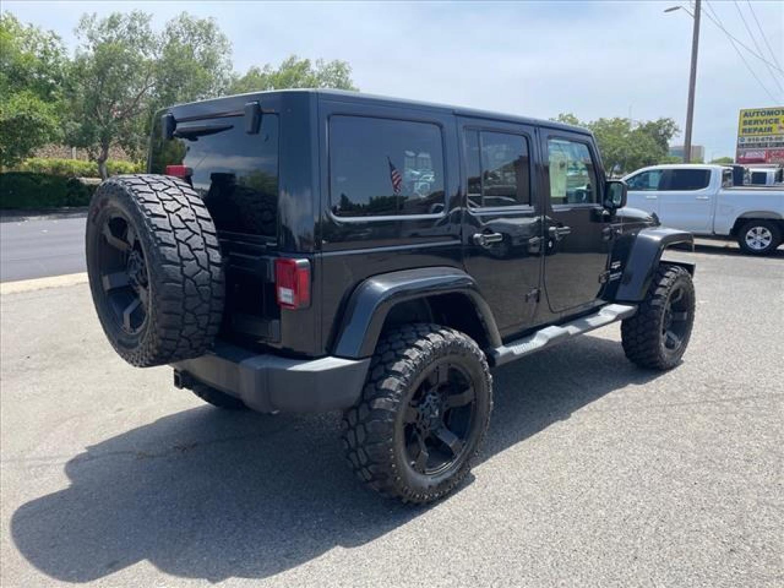 2013 Black Clear Coat Jeep Wrangler Unlimited Sahara (1C4BJWEG2DL) with an 3.6L 3.6L V6 285hp 260ft. lbs. Sequential Multiport Fuel Injection engine, 5-Speed Automatic transmission, located at 800 Riverside Ave, Roseville, CA, 95678, (916) 773-4549, 38.732265, -121.291039 - 4X4 UNLIMITED SAHARA HARDTOP CUSTOM WHEELS ONE OWNER - Photo #4