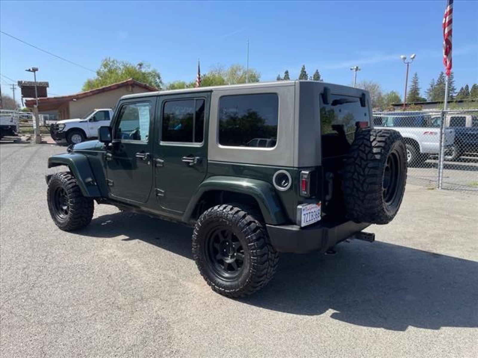 2010 Natural Green Pearl Coat Jeep Wrangler Unlimited Sahara (1J4BA5H15AL) with an 3.8L 3.8L V6 205hp 240ft. lbs. Sequential Multiport Fuel Injection engine, 4-Speed Automatic transmission, located at 800 Riverside Ave, Roseville, CA, 95678, (916) 773-4549, 38.732265, -121.291039 - Photo #2