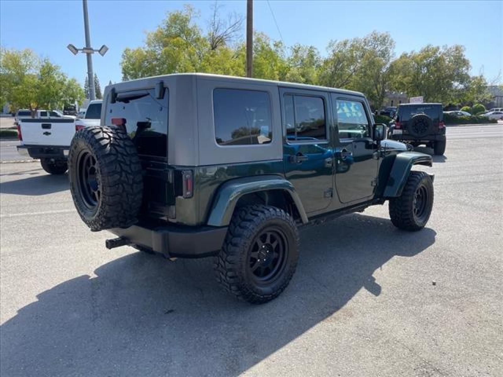 2010 Natural Green Pearl Coat Jeep Wrangler Unlimited Sahara (1J4BA5H15AL) with an 3.8L 3.8L V6 205hp 240ft. lbs. Sequential Multiport Fuel Injection engine, 4-Speed Automatic transmission, located at 800 Riverside Ave, Roseville, CA, 95678, (916) 773-4549, 38.732265, -121.291039 - Photo #3