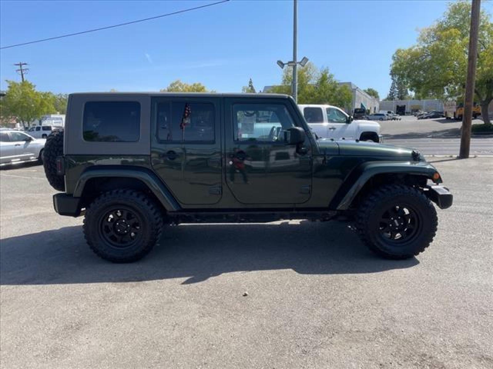 2010 Natural Green Pearl Coat Jeep Wrangler Unlimited Sahara (1J4BA5H15AL) with an 3.8L 3.8L V6 205hp 240ft. lbs. Sequential Multiport Fuel Injection engine, 4-Speed Automatic transmission, located at 800 Riverside Ave, Roseville, CA, 95678, (916) 773-4549, 38.732265, -121.291039 - Photo #5