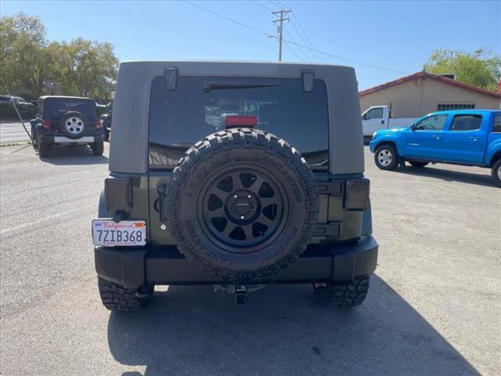 2010 Natural Green Pearl Coat Jeep Wrangler Unlimited Sahara (1J4BA5H15AL) with an 3.8L 3.8L V6 205hp 240ft. lbs. Sequential Multiport Fuel Injection engine, 4-Speed Automatic transmission, located at 800 Riverside Ave, Roseville, CA, 95678, (916) 773-4549, 38.732265, -121.291039 - 4X4 UNLIMITED SAHARA HARDTOP LOW MILES CLEAN CARFAX - Photo #8