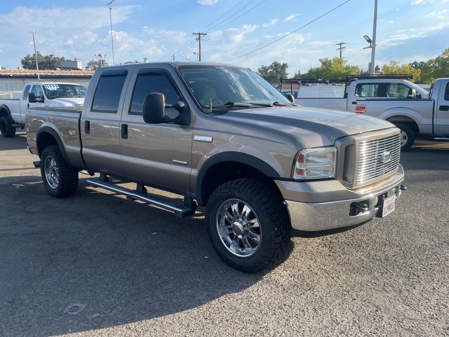 2006 Arizona Beige Clearcoat Metallic Ford F-250 Super Duty Lariat (1FTSW21P76E) with an 6.0L Power Stroke 6.0L Diesel Turbo V8 325hp 560ft. lbs. Direct Injection engine, 5-Speed Automatic transmission, located at 800 Riverside Ave, Roseville, CA, 95678, (916) 773-4549, 38.732265, -121.291039 - DIESEL CREW CAB 4X4 LARIAT MOON ROOF- Photo#1