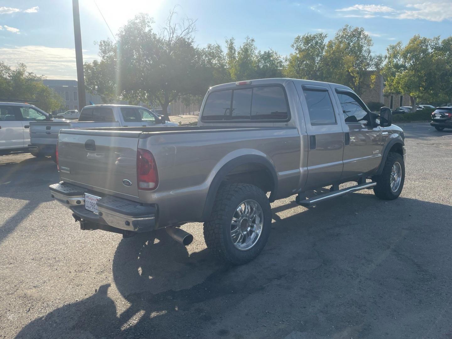 2006 Arizona Beige Clearcoat Metallic Ford F-250 Super Duty Lariat (1FTSW21P76E) with an 6.0L Power Stroke 6.0L Diesel Turbo V8 325hp 560ft. lbs. Direct Injection engine, 5-Speed Automatic transmission, located at 800 Riverside Ave, Roseville, CA, 95678, (916) 773-4549, 38.732265, -121.291039 - DIESEL CREW CAB 4X4 LARIAT MOON ROOF- Photo#3