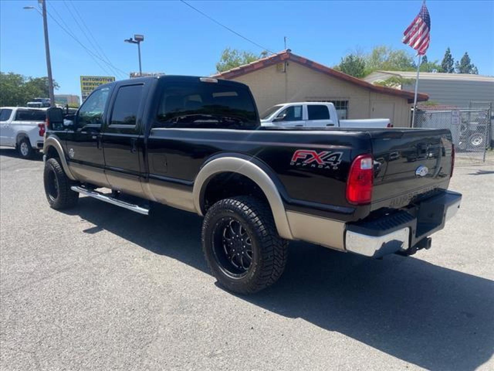 2014 Kodiak Brown Metallic Ford F-350 Super Duty Lariat (1FT8W3BT0EE) with an 6.7L Power Stroke 6.7L Biodies Common Rail Direct Injection engine, 6-Speed Shiftable Automatic transmission, located at 800 Riverside Ave, Roseville, CA, 95678, (916) 773-4549, 38.732265, -121.291039 - DIESEL CREW CAB 4X4 FX4 LARIAT FULLY LOADED MOON ROOF CLEAN CARFAX - Photo #2