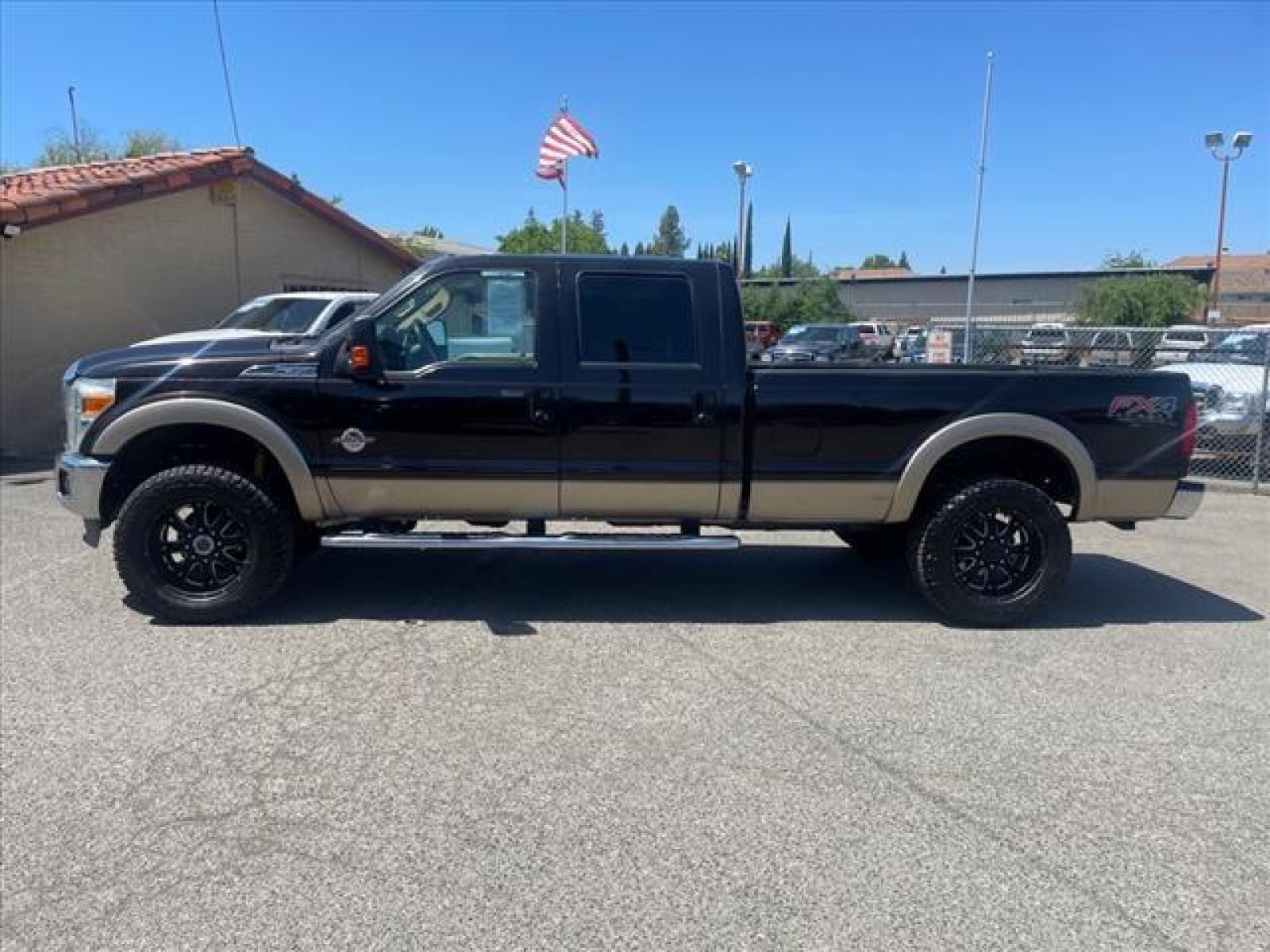 2014 Kodiak Brown Metallic Ford F-350 Super Duty Lariat (1FT8W3BT0EE) with an 6.7L Power Stroke 6.7L Biodies Common Rail Direct Injection engine, 6-Speed Shiftable Automatic transmission, located at 800 Riverside Ave, Roseville, CA, 95678, (916) 773-4549, 38.732265, -121.291039 - DIESEL CREW CAB 4X4 FX4 LARIAT FULLY LOADED MOON ROOF CLEAN CARFAX - Photo #4