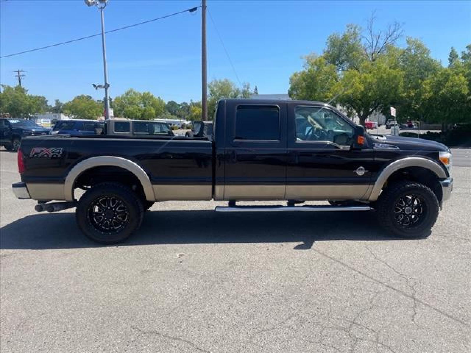 2014 Kodiak Brown Metallic Ford F-350 Super Duty Lariat (1FT8W3BT0EE) with an 6.7L Power Stroke 6.7L Biodies Common Rail Direct Injection engine, 6-Speed Shiftable Automatic transmission, located at 800 Riverside Ave, Roseville, CA, 95678, (916) 773-4549, 38.732265, -121.291039 - DIESEL CREW CAB 4X4 FX4 LARIAT FULLY LOADED MOON ROOF CLEAN CARFAX - Photo #5