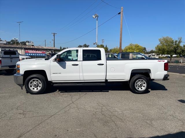2018 Summit White Chevrolet Silverado 2500HD Work Truck (1GC1KUEY3JF) with an 6.6L Duramax 6.6L Biodiesel Turbo V8 445hp 910ft. lbs. Common Rail Direct Injection engine, 6-Speed Shiftable Automatic transmission, located at 800 Riverside Ave, Roseville, CA, 95678, 916-773-4549 & Toll Free: 866-719-4393, 38.732265, -121.291039 - DURAMAX DIESEL CREW CAB 4X4 ONE OWNER CLEAN CARFAX - Photo #4