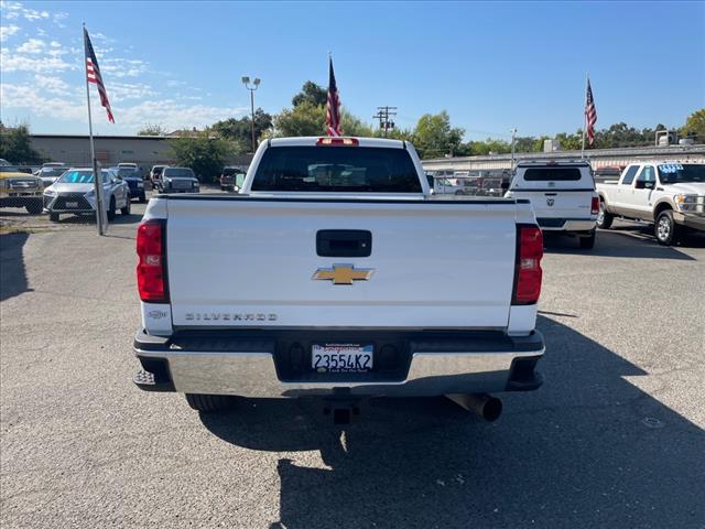2018 Summit White Chevrolet Silverado 2500HD Work Truck (1GC1KUEY3JF) with an 6.6L Duramax 6.6L Biodiesel Turbo V8 445hp 910ft. lbs. Common Rail Direct Injection engine, 6-Speed Shiftable Automatic transmission, located at 800 Riverside Ave, Roseville, CA, 95678, 916-773-4549 & Toll Free: 866-719-4393, 38.732265, -121.291039 - DURAMAX DIESEL CREW CAB 4X4 ONE OWNER CLEAN CARFAX - Photo #8