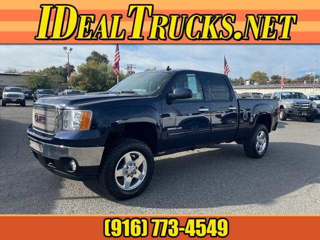 2012 Midnight Blue Metallic GMC Sierra 2500HD SLT (1GT121E87CF) with an 6.6L Duramax 6.6L Diesel Turbo V8 397hp 765ft. lbs. Common Rail Direct Injection engine, Allison 1000 6-Speed Shiftable Automatic transmission, located at 800 Riverside Ave, Roseville, CA, 95678, 916-773-4549 & Toll Free: 866-719-4393, 38.732265, -121.291039 - DURAMAX DIESEL CREW CAB 4X4 SLT 87K MILES DVD ALLISON TRANSMISSION - Photo #0