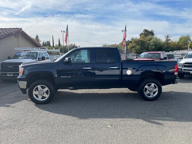 2012 Midnight Blue Metallic GMC Sierra 2500HD SLT (1GT121E87CF) with an 6.6L Duramax 6.6L Diesel Turbo V8 397hp 765ft. lbs. Common Rail Direct Injection engine, Allison 1000 6-Speed Shiftable Automatic transmission, located at 800 Riverside Ave, Roseville, CA, 95678, 916-773-4549 & Toll Free: 866-719-4393, 38.732265, -121.291039 - DURAMAX DIESEL CREW CAB 4X4 SLT 87K MILES DVD ALLISON TRANSMISSION - Photo #4