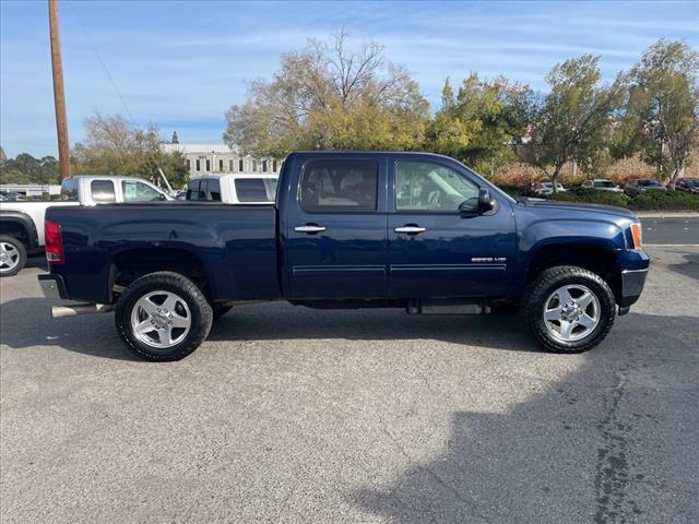 2012 Midnight Blue Metallic GMC Sierra 2500HD SLT (1GT121E87CF) with an 6.6L Duramax 6.6L Diesel Turbo V8 397hp 765ft. lbs. Common Rail Direct Injection engine, Allison 1000 6-Speed Shiftable Automatic transmission, located at 800 Riverside Ave, Roseville, CA, 95678, 916-773-4549 & Toll Free: 866-719-4393, 38.732265, -121.291039 - DURAMAX DIESEL CREW CAB 4X4 SLT 87K MILES DVD ALLISON TRANSMISSION - Photo #5