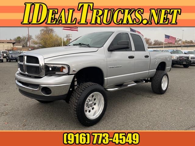 2004 Bright Silver Metallic Clearcoat Dodge Ram 2500 SLT (3D7KU286X4G) with an Cummins 5.9L Diesel Turbo I6 235hp 460ft. lbs. Other engine, 4-Speed Automatic transmission, located at 800 Riverside Ave, Roseville, CA, 95678, 916-773-4549 & Toll Free: 866-719-4393, 38.732265, -121.291039 - CUMMINS DIESEL QUAD CAB 4X4 SLT LOW MILES LIFTED CLEAN CARFAX - Photo #0