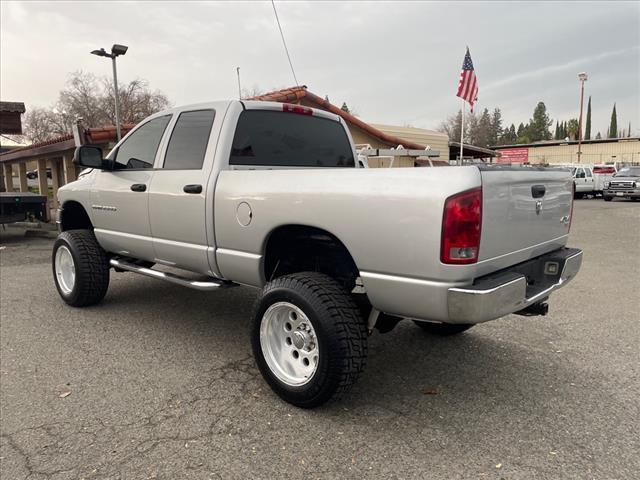 2004 Bright Silver Metallic Clearcoat Dodge Ram 2500 SLT (3D7KU286X4G) with an Cummins 5.9L Diesel Turbo I6 235hp 460ft. lbs. Other engine, 4-Speed Automatic transmission, located at 800 Riverside Ave, Roseville, CA, 95678, 916-773-4549 & Toll Free: 866-719-4393, 38.732265, -121.291039 - CUMMINS DIESEL QUAD CAB 4X4 SLT LOW MILES LIFTED CLEAN CARFAX - Photo #2
