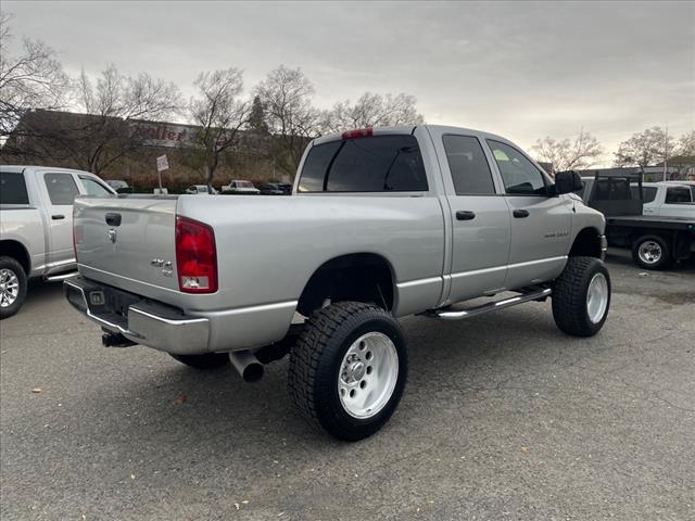 2004 Bright Silver Metallic Clearcoat Dodge Ram 2500 SLT (3D7KU286X4G) with an Cummins 5.9L Diesel Turbo I6 235hp 460ft. lbs. Other engine, 4-Speed Automatic transmission, located at 800 Riverside Ave, Roseville, CA, 95678, 916-773-4549 & Toll Free: 866-719-4393, 38.732265, -121.291039 - CUMMINS DIESEL QUAD CAB 4X4 SLT LOW MILES LIFTED CLEAN CARFAX - Photo #3
