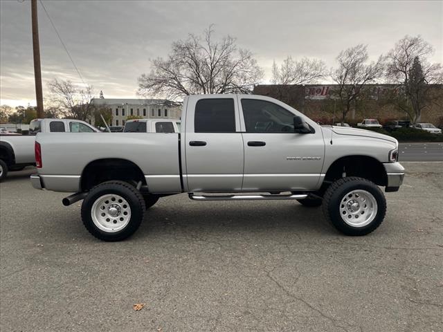 2004 Bright Silver Metallic Clearcoat Dodge Ram 2500 SLT (3D7KU286X4G) with an Cummins 5.9L Diesel Turbo I6 235hp 460ft. lbs. Other engine, 4-Speed Automatic transmission, located at 800 Riverside Ave, Roseville, CA, 95678, 916-773-4549 & Toll Free: 866-719-4393, 38.732265, -121.291039 - CUMMINS DIESEL QUAD CAB 4X4 SLT LOW MILES LIFTED CLEAN CARFAX - Photo #5