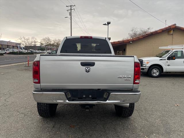 2004 Bright Silver Metallic Clearcoat Dodge Ram 2500 SLT (3D7KU286X4G) with an Cummins 5.9L Diesel Turbo I6 235hp 460ft. lbs. Other engine, 4-Speed Automatic transmission, located at 800 Riverside Ave, Roseville, CA, 95678, 916-773-4549 & Toll Free: 866-719-4393, 38.732265, -121.291039 - CUMMINS DIESEL QUAD CAB 4X4 SLT LOW MILES LIFTED CLEAN CARFAX - Photo #8