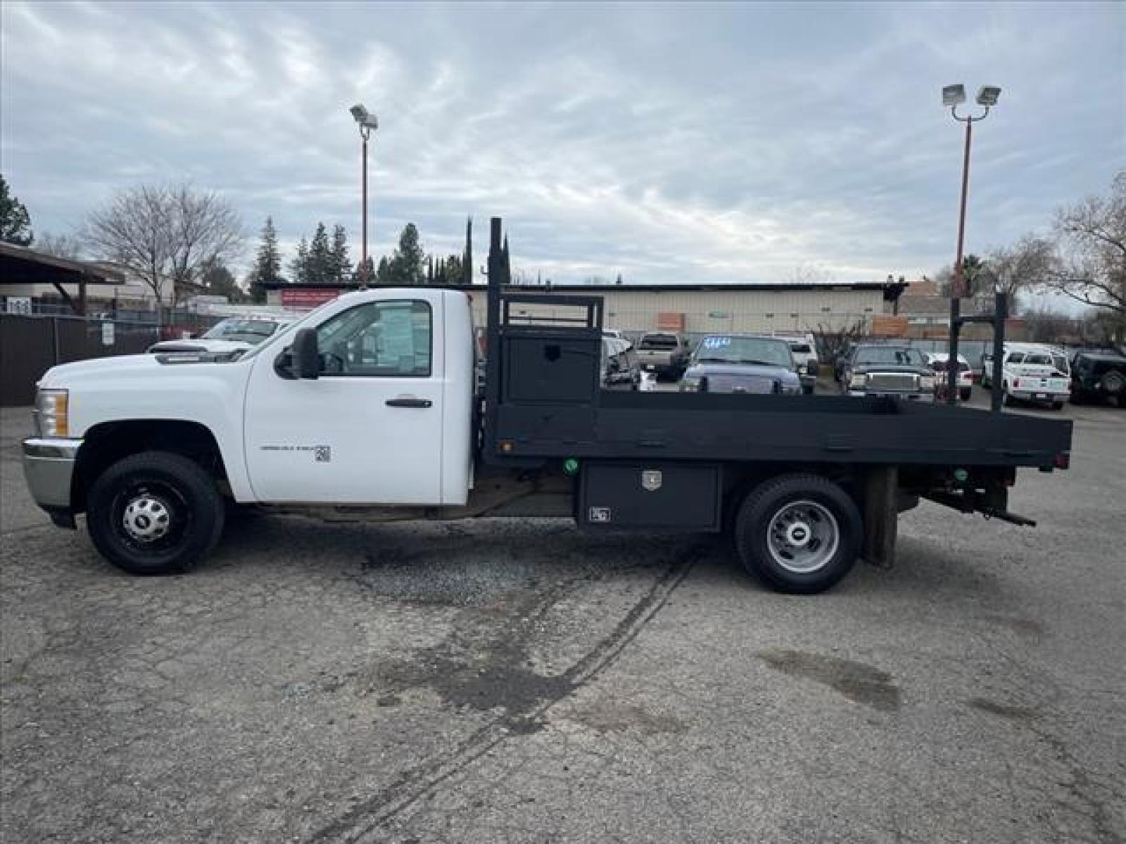 2013 Summit White Chevrolet Silverado 3500HD Work Truck (1GB3CZC84DF) with an 6.6L Duramax 6.6L Diesel Turbo V8 397hp 765ft. lbs. Common Rail Direct Injection engine, Allison 1000 6-Speed Shiftable Automatic transmission, located at 800 Riverside Ave, Roseville, CA, 95678, (916) 773-4549, 38.732265, -121.291039 - DURAMAX DIESEL DUALLY FLATBED ALLISON TRANSMISSION ONE SERVICE RECORDS ONE OWNER - Photo #1
