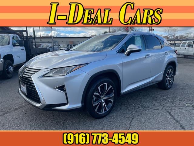 2017 Atomic Silver Lexus RX 350 Base (2T2ZZMCA4HC) with an 3.5L 3.5L V6 295hp 267ft. lbs. Direct Injection engine, 8-Speed Shiftable Automatic transmission, located at 800 Riverside Ave, Roseville, CA, 95678, 916-773-4549 & Toll Free: 866-719-4393, 38.732265, -121.291039 - PREMIUM PACKAGE NEW TIRES FULLY LOADED CLEAN CARFAX - Photo #0