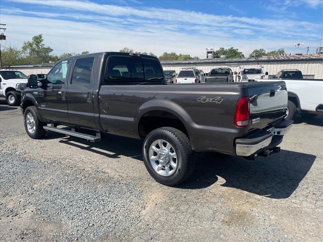 2005 Dark Stone Clearcoat Metallic Ford F-350 Super Duty XLT (1FTWW31P45E) with an 6.0L Power Stroke 6.0L Diesel Turbo V8 325hp 560ft. lbs. Direct Injection engine, 5-Speed Automatic transmission, located at 800 Riverside Ave, Roseville, CA, 95678, 916-773-4549 & Toll Free: 866-719-4393, 38.732265, -121.291039 - DIESEL CREW CAB 4X4 90K MILES CLEAN CARFAX - Photo #2