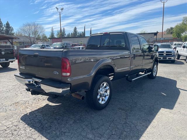 2005 Dark Stone Clearcoat Metallic Ford F-350 Super Duty XLT (1FTWW31P45E) with an 6.0L Power Stroke 6.0L Diesel Turbo V8 325hp 560ft. lbs. Direct Injection engine, 5-Speed Automatic transmission, located at 800 Riverside Ave, Roseville, CA, 95678, 916-773-4549 & Toll Free: 866-719-4393, 38.732265, -121.291039 - DIESEL CREW CAB 4X4 90K MILES CLEAN CARFAX - Photo #3
