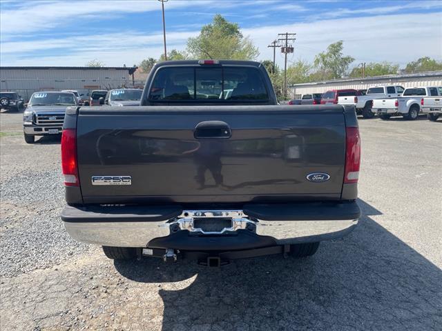 2005 Dark Stone Clearcoat Metallic Ford F-350 Super Duty XLT (1FTWW31P45E) with an 6.0L Power Stroke 6.0L Diesel Turbo V8 325hp 560ft. lbs. Direct Injection engine, 5-Speed Automatic transmission, located at 800 Riverside Ave, Roseville, CA, 95678, 916-773-4549 & Toll Free: 866-719-4393, 38.732265, -121.291039 - DIESEL CREW CAB 4X4 90K MILES CLEAN CARFAX - Photo #7