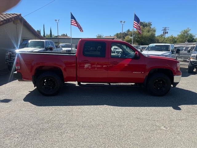 2007 Fire Red GMC Sierra 1500 SLT (2GTFK13Y871) with an 6.0L VortecMAX 6.0L V8 367hp 375ft. lbs. Other engine, 4-Speed Automatic transmission, located at 800 Riverside Ave, Roseville, CA, 95678, (916) 773-4549, 38.732265, -121.291039 - 4X4 CREW CAB SLT VORTEC MAX LOW MILES LEATHER DVD ONE OWNER SERVICE RECORDS - Photo#7
