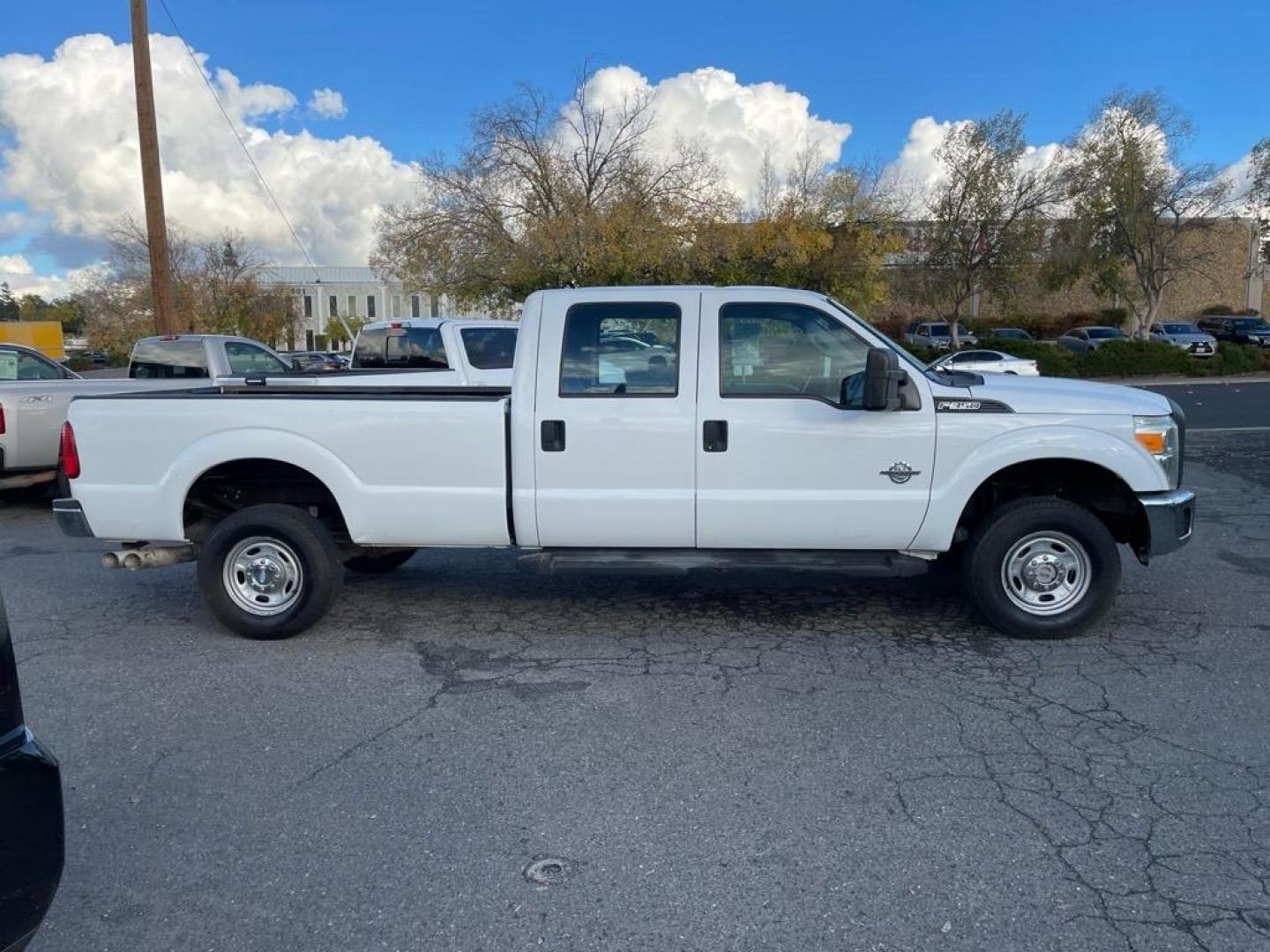 2013 Oxford White Ford F-350 Super Duty XL (1FT8W3BT4DE) with an 6.7L Power Stroke 6.7L Biodiesel Turbo V8 400hp 800ft. lbs. Common Rail Direct Injection engine, 6-Speed Shiftable Automatic transmission, located at 800 Riverside Ave, Roseville, CA, 95678, (916) 773-4549, 38.732265, -121.291039 - DIESEL CREW CAB 4X4 ONE OWNER CLEAN CARFAX - Photo#6