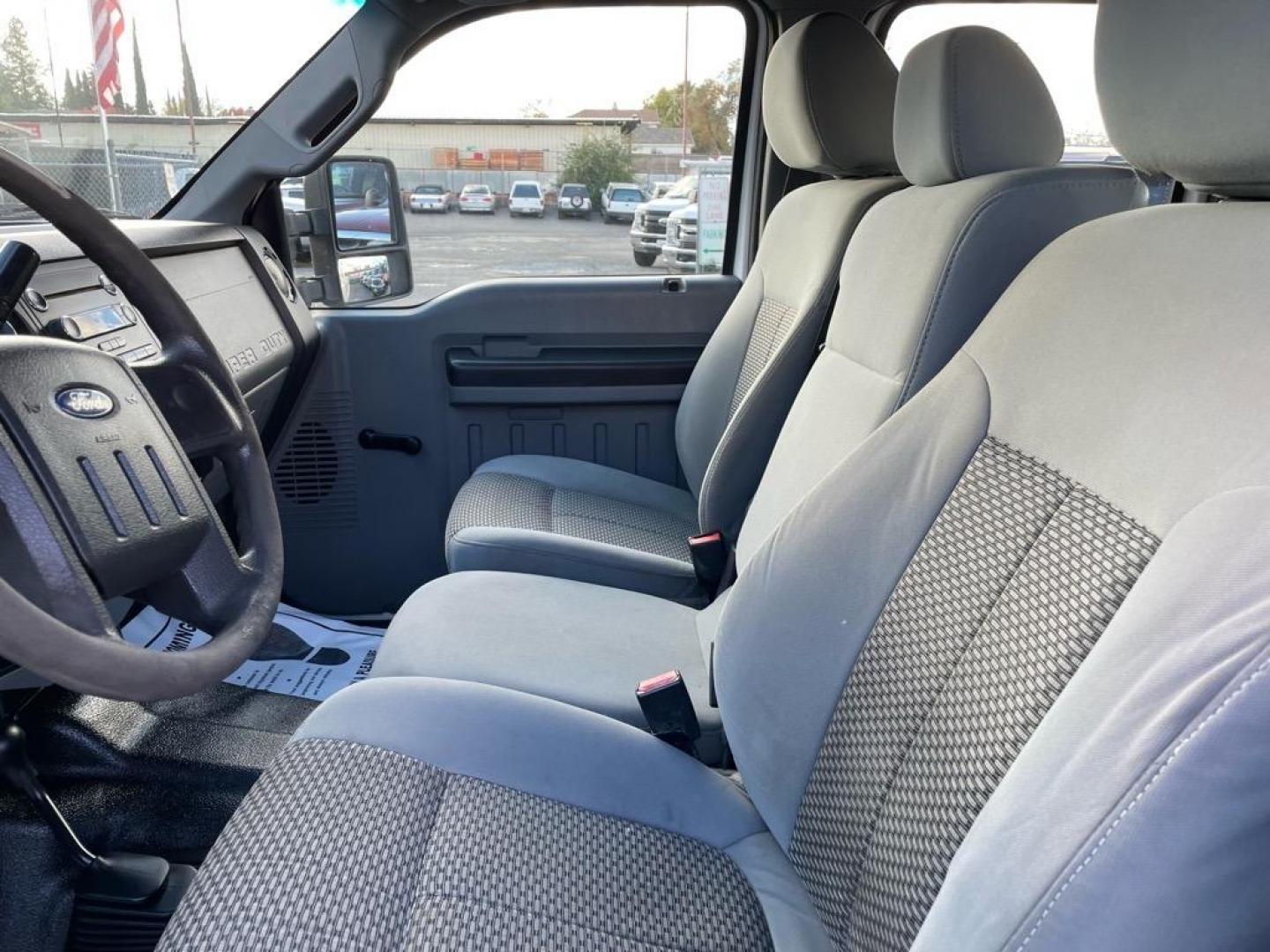 2013 Oxford White Ford F-350 Super Duty XL (1FT8W3BT4DE) with an 6.7L Power Stroke 6.7L Biodiesel Turbo V8 400hp 800ft. lbs. Common Rail Direct Injection engine, 6-Speed Shiftable Automatic transmission, located at 800 Riverside Ave, Roseville, CA, 95678, (916) 773-4549, 38.732265, -121.291039 - DIESEL CREW CAB 4X4 ONE OWNER CLEAN CARFAX - Photo#10