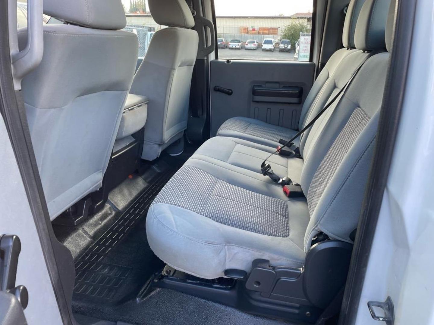 2013 Oxford White Ford F-350 Super Duty XL (1FT8W3BT4DE) with an 6.7L Power Stroke 6.7L Biodiesel Turbo V8 400hp 800ft. lbs. Common Rail Direct Injection engine, 6-Speed Shiftable Automatic transmission, located at 800 Riverside Ave, Roseville, CA, 95678, (916) 773-4549, 38.732265, -121.291039 - DIESEL CREW CAB 4X4 ONE OWNER CLEAN CARFAX - Photo#12