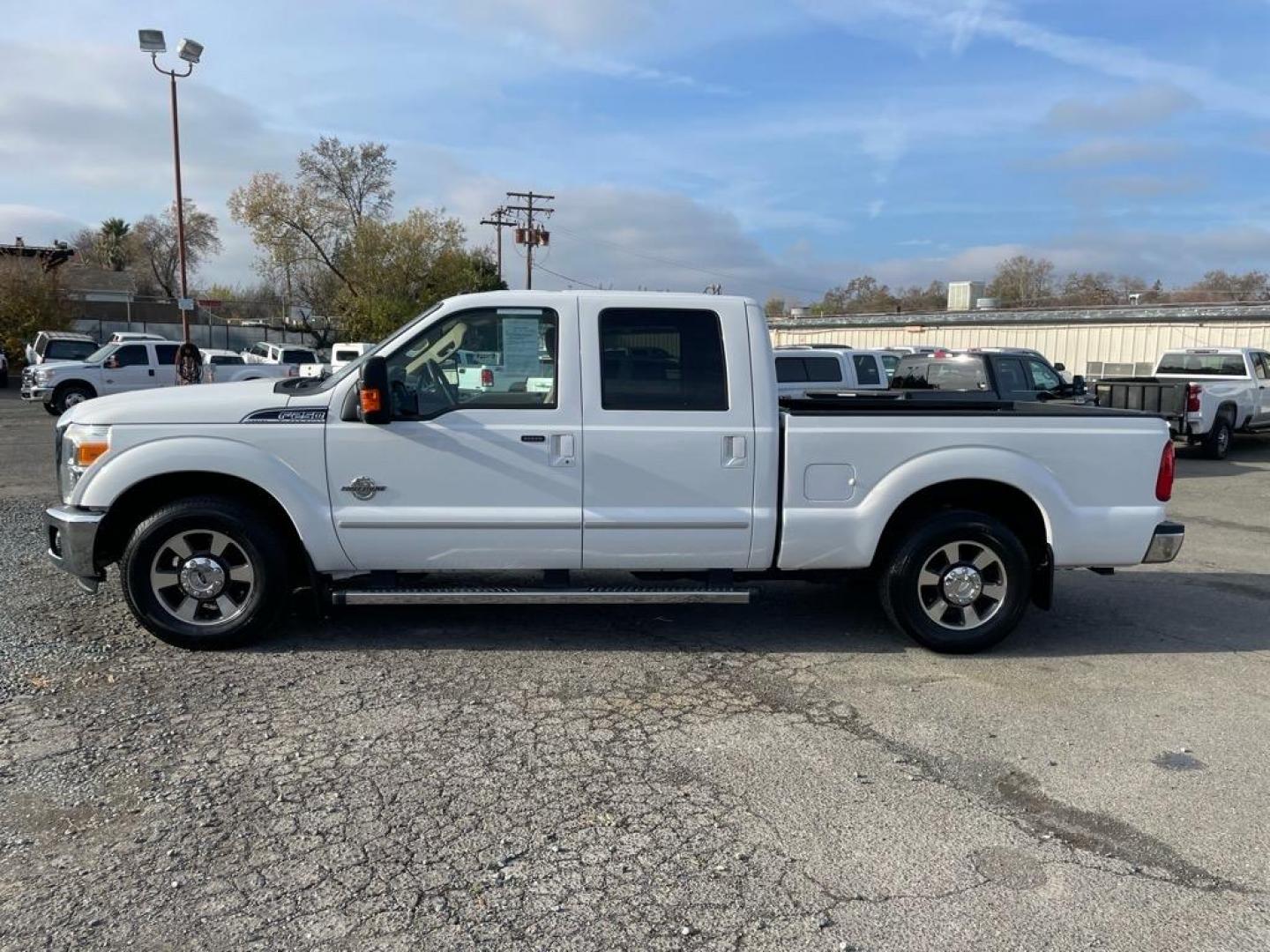 2011 Oxford White Ford F-250 Super Duty Lariat (1FT7W2AT2BE) with an 6.7L Power Stroke 6.7L Biodiesel Turbo V8 400hp 800ft. lbs. Common Rail Direct Injection engine, 6-Speed Shiftable Automatic transmission, located at 800 Riverside Ave, Roseville, CA, 95678, (916) 773-4549, 38.732265, -121.291039 - DIESEL CREW CAB LARIAT LOW MILES - Photo#4