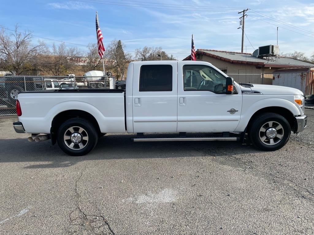 2011 Oxford White Ford F-250 Super Duty Lariat (1FT7W2AT2BE) with an 6.7L Power Stroke 6.7L Biodiesel Turbo V8 400hp 800ft. lbs. Common Rail Direct Injection engine, 6-Speed Shiftable Automatic transmission, located at 800 Riverside Ave, Roseville, CA, 95678, (916) 773-4549, 38.732265, -121.291039 - DIESEL CREW CAB LARIAT LOW MILES - Photo#5