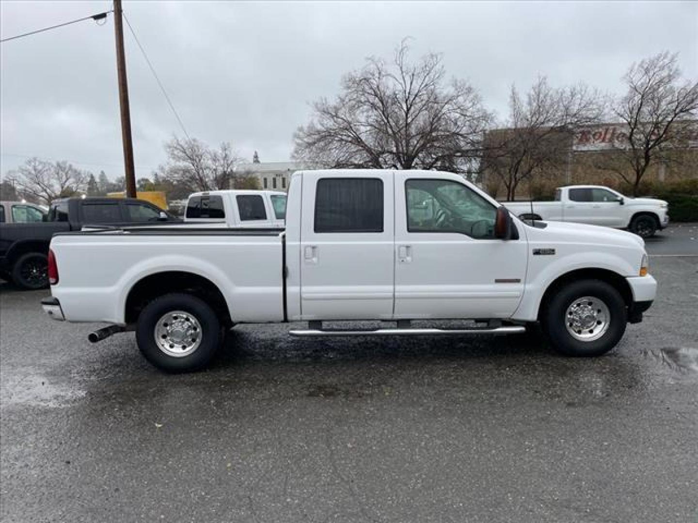 2003 Oxford White Ford F-250 Super Duty XLT (1FTNW20P43E) with an 6.0L Power Stroke 6.0L Diesel Turbo V8 325hp 560ft. lbs. Other engine, 5-Speed Automatic transmission, located at 800 Riverside Ave, Roseville, CA, 95678, (916) 773-4549, 38.732265, -121.291039 - Photo#5