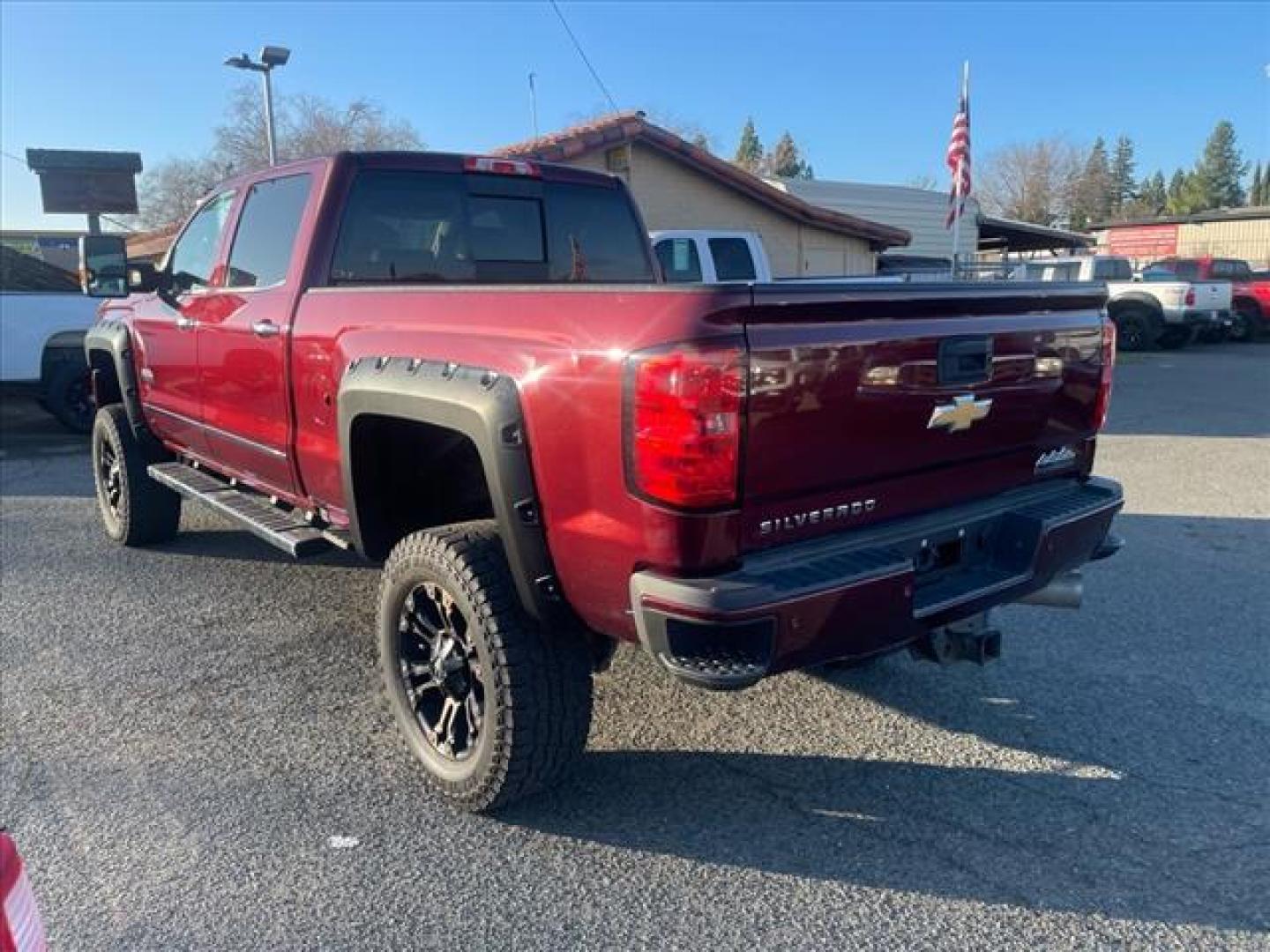 2016 Butte Red Metallic Chevrolet Silverado 2500HD High Country (1GC1KXE87GF) with an 6.6L Duramax 6.6L Diesel Turbo V8 397hp 765ft. lbs. Common Rail Direct Injection engine, Allison 1000 6-Speed Shiftable Automatic transmission, located at 800 Riverside Ave, Roseville, CA, 95678, (916) 773-4549, 38.732265, -121.291039 - DURAMAX DIESEL CREW CAB 4X4 HIGH COUNTY LIFTED ALLISON TRANSMISSION SERVICE RECORDS ON CLEAN CARFAX - Photo#4