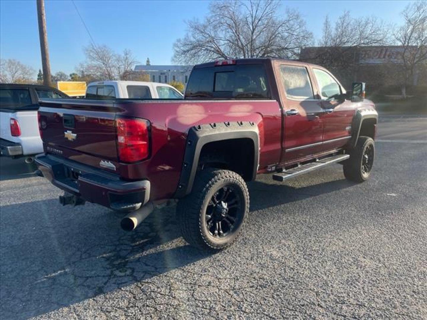 2016 Butte Red Metallic Chevrolet Silverado 2500HD High Country (1GC1KXE87GF) with an 6.6L Duramax 6.6L Diesel Turbo V8 397hp 765ft. lbs. Common Rail Direct Injection engine, Allison 1000 6-Speed Shiftable Automatic transmission, located at 800 Riverside Ave, Roseville, CA, 95678, (916) 773-4549, 38.732265, -121.291039 - DURAMAX DIESEL CREW CAB 4X4 HIGH COUNTY LIFTED ALLISON TRANSMISSION SERVICE RECORDS ON CLEAN CARFAX - Photo#5