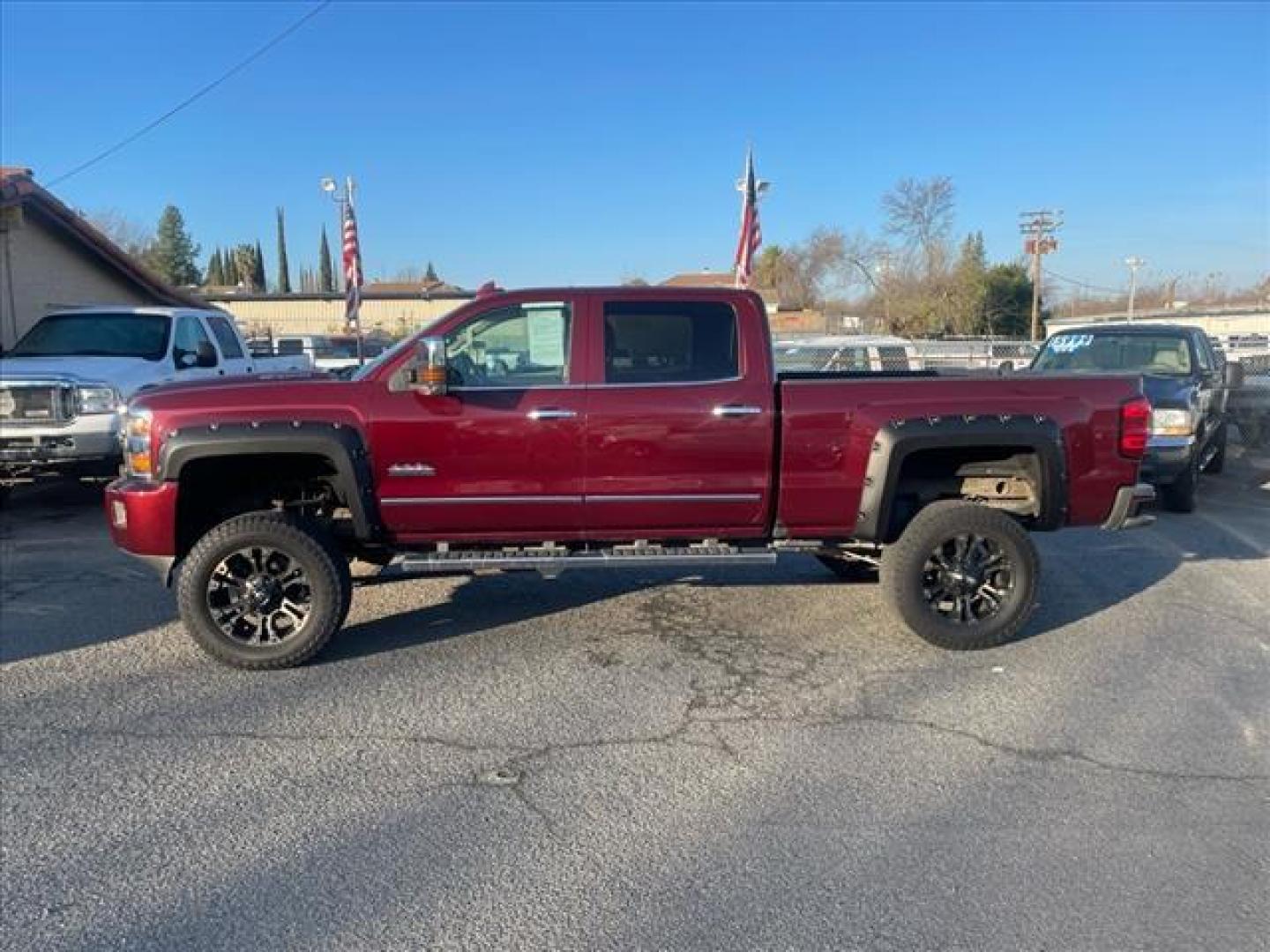 2016 Butte Red Metallic Chevrolet Silverado 2500HD High Country (1GC1KXE87GF) with an 6.6L Duramax 6.6L Diesel Turbo V8 397hp 765ft. lbs. Common Rail Direct Injection engine, Allison 1000 6-Speed Shiftable Automatic transmission, located at 800 Riverside Ave, Roseville, CA, 95678, (916) 773-4549, 38.732265, -121.291039 - DURAMAX DIESEL CREW CAB 4X4 HIGH COUNTY LIFTED ALLISON TRANSMISSION SERVICE RECORDS ON CLEAN CARFAX - Photo#6