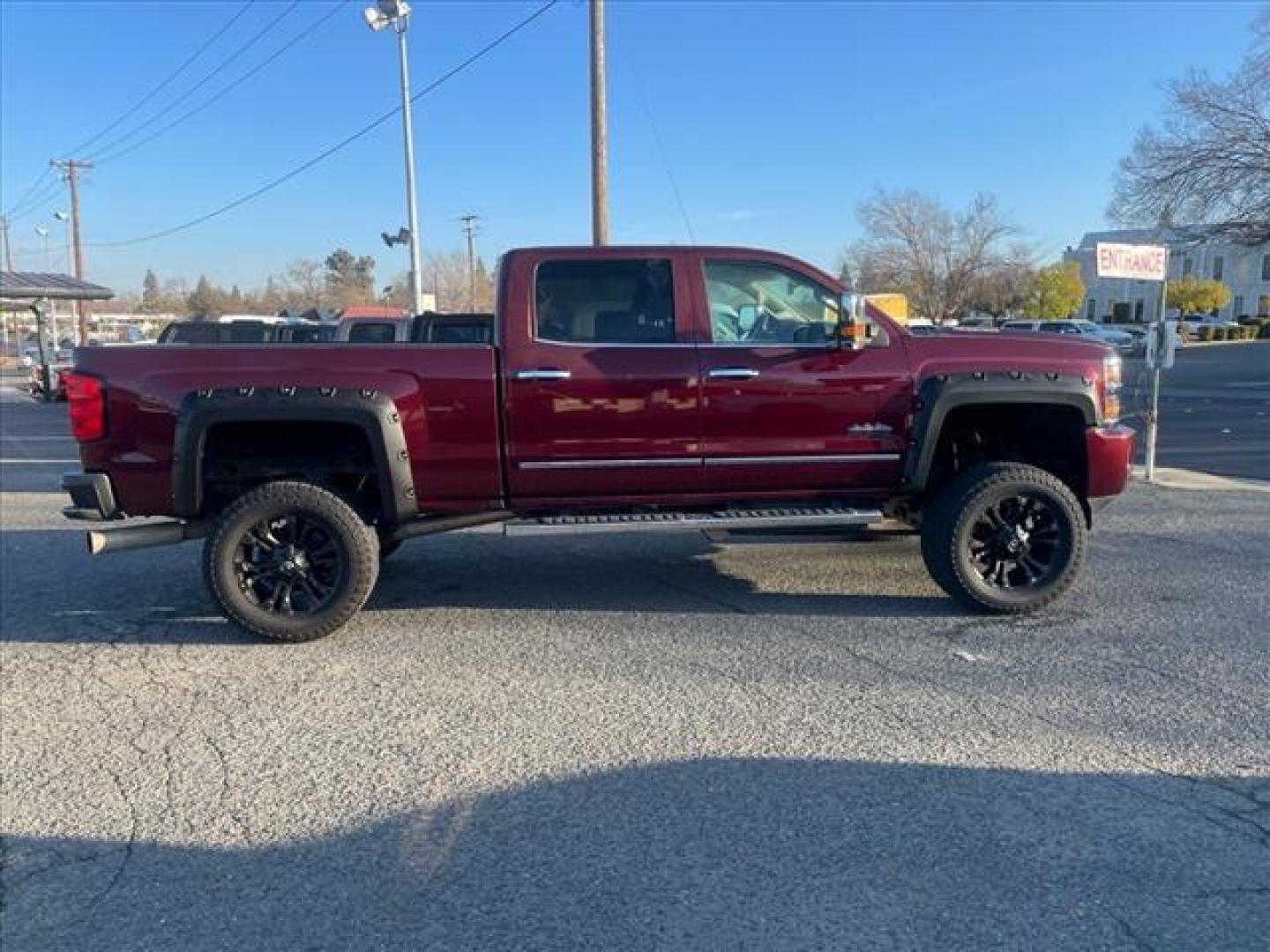2016 Butte Red Metallic Chevrolet Silverado 2500HD High Country (1GC1KXE87GF) with an 6.6L Duramax 6.6L Diesel Turbo V8 397hp 765ft. lbs. Common Rail Direct Injection engine, Allison 1000 6-Speed Shiftable Automatic transmission, located at 800 Riverside Ave, Roseville, CA, 95678, (916) 773-4549, 38.732265, -121.291039 - DURAMAX DIESEL CREW CAB 4X4 HIGH COUNTY LIFTED ALLISON TRANSMISSION SERVICE RECORDS ON CLEAN CARFAX - Photo#7