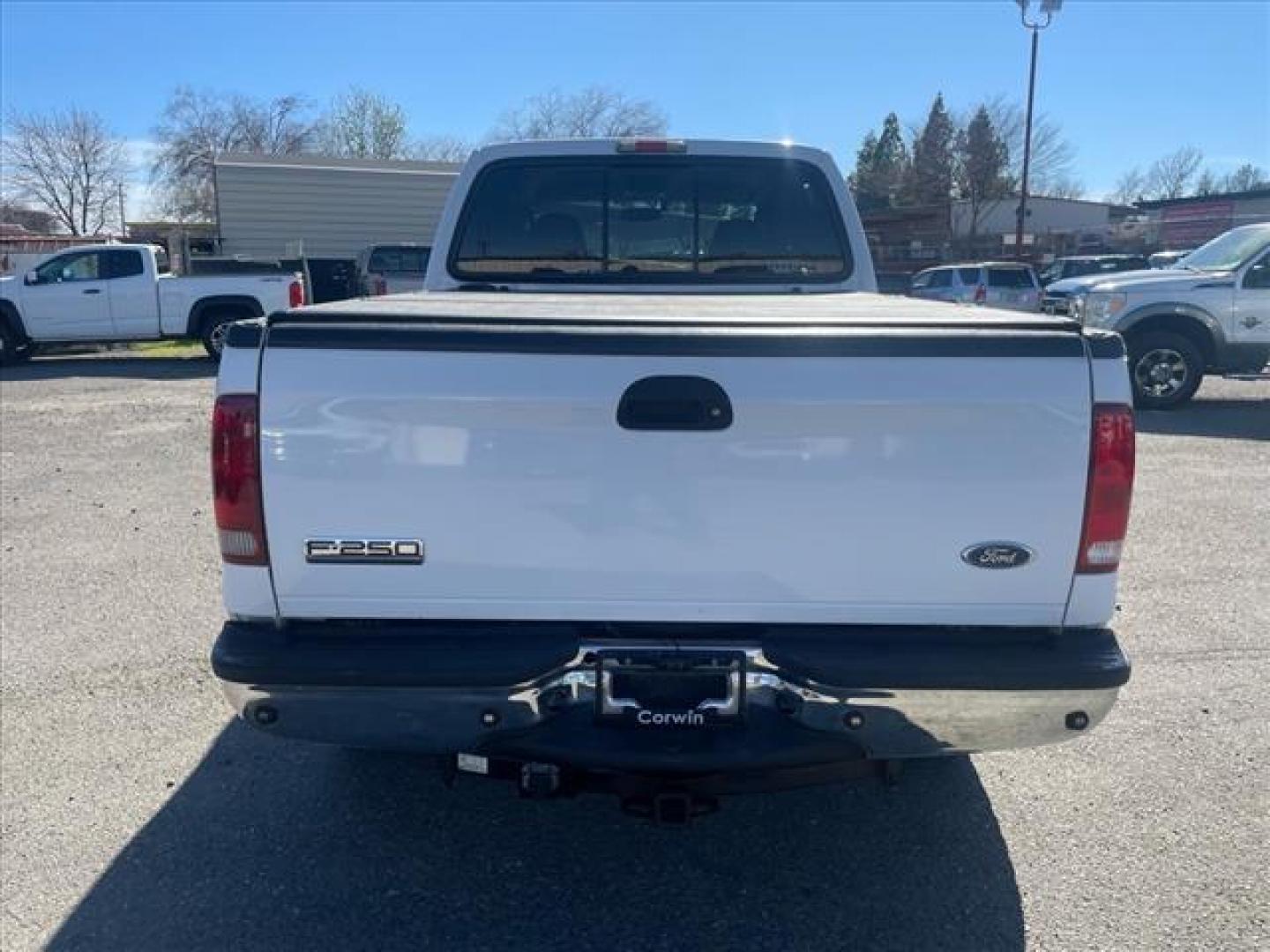 2005 Oxford White Clearcoat Ford F-250 Super Duty Lariat (1FTSW21PX5E) with an 6.0L Power Stroke 6.0L Diesel Turbo V8 325hp 560ft. lbs. Direct Injection engine, 5-Speed Automatic transmission, located at 800 Riverside Ave, Roseville, CA, 95678, (916) 773-4549, 38.732265, -121.291039 - DIESEL CREW CAB 4X4 FX4 LARIAT HEADSTUDS LIFTED AIR BAG SUSPENSION POWER RUNNING BOARDS CLEAN CARFAX - Photo#9