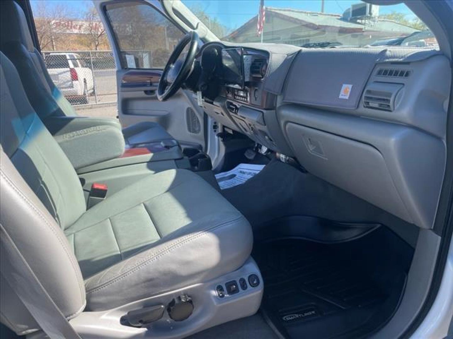 2005 Oxford White Clearcoat Ford F-250 Super Duty Lariat (1FTSW21PX5E) with an 6.0L Power Stroke 6.0L Diesel Turbo V8 325hp 560ft. lbs. Direct Injection engine, 5-Speed Automatic transmission, located at 800 Riverside Ave, Roseville, CA, 95678, (916) 773-4549, 38.732265, -121.291039 - DIESEL CREW CAB 4X4 FX4 LARIAT HEADSTUDS LIFTED AIR BAG SUSPENSION POWER RUNNING BOARDS CLEAN CARFAX - Photo#16