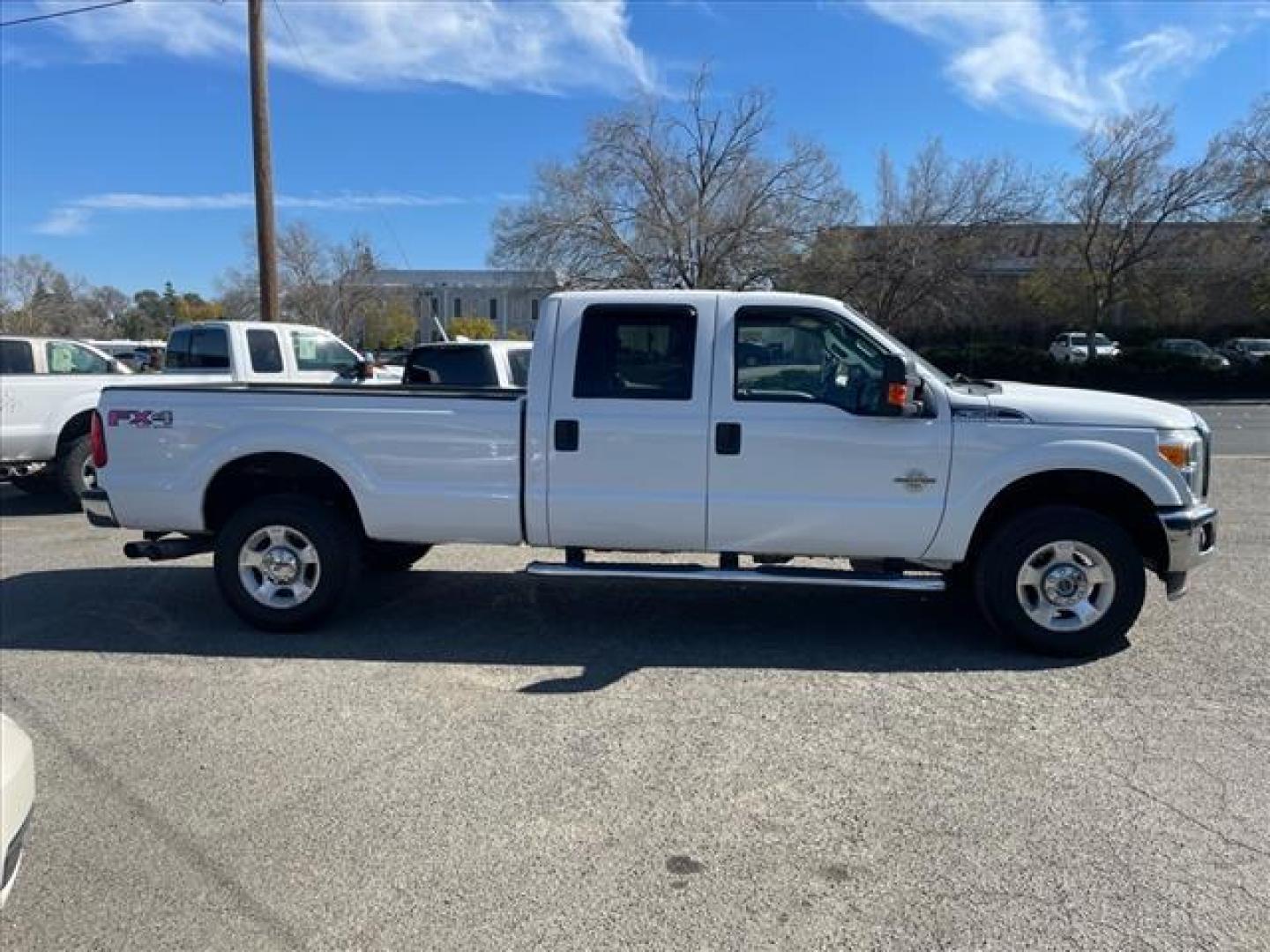 2012 Oxford White Ford F-350 Super Duty XLT (1FT8W3BTXCE) with an 6.7L Power Stroke 6.7L Biodiesel Turbo V8 400hp 800ft. lbs. Common Rail Direct Injection engine, 6-Speed Shiftable Automatic transmission, located at 800 Riverside Ave, Roseville, CA, 95678, (916) 773-4549, 38.732265, -121.291039 - DIESEL CREW CAB 4X4 FX4 XLT SERVICE RECORDS ON CLEAN CARFAX - Photo#5