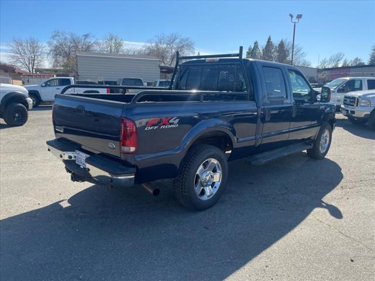 2007 True Blue Clearcoat Metallic Ford F-250 Super Duty Lariat (1FTSW21P37E) with an 6.0L 6.0L Turbo Diesel V8 OHV 32V Direct Injection engine, 5-Speed Automatic transmission, located at 800 Riverside Ave, Roseville, CA, 95678, (916) 773-4549, 38.732265, -121.291039 - DIESEL CREW CAB 4X4 FX4 LARIAT LOW MILES MOON ROOF ONE OWNER CLEAN CARFAX - Photo#3