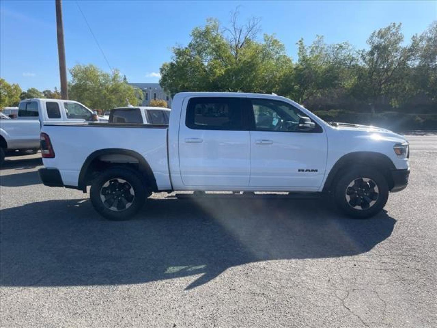 2020 Bright White Clear Coat RAM 1500 Rebel (1C6SRFLT3LN) with an 5.7L HEMI 5.7L V8 395hp 410ft. lbs. Sequential Multiport Fuel Injection engine, 8-Speed Shiftable Automatic transmission, located at 800 Riverside Ave, Roseville, CA, 95678, (916) 773-4549, 38.732265, -121.291039 - Photo#5