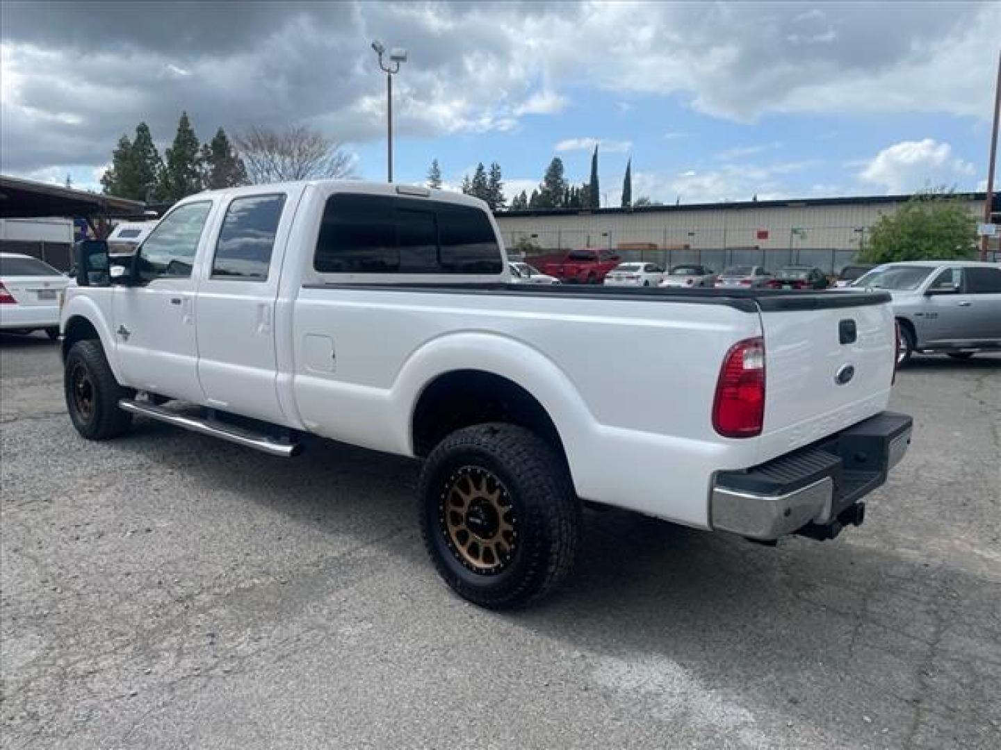 2012 Oxford White Ford F-350 Super Duty Lariat (1FT8W3BT1CE) with an 6.7L Power Stroke 6.7L Biodiesel Turbo V8 400hp 800ft. lbs. Common Rail Direct Injection engine, 6-Speed Shiftable Automatic transmission, located at 800 Riverside Ave, Roseville, CA, 95678, (916) 773-4549, 38.732265, -121.291039 - Photo#2