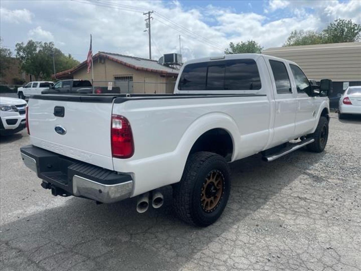 2012 Oxford White Ford F-350 Super Duty Lariat (1FT8W3BT1CE) with an 6.7L Power Stroke 6.7L Biodiesel Turbo V8 400hp 800ft. lbs. Common Rail Direct Injection engine, 6-Speed Shiftable Automatic transmission, located at 800 Riverside Ave, Roseville, CA, 95678, (916) 773-4549, 38.732265, -121.291039 - Photo#4