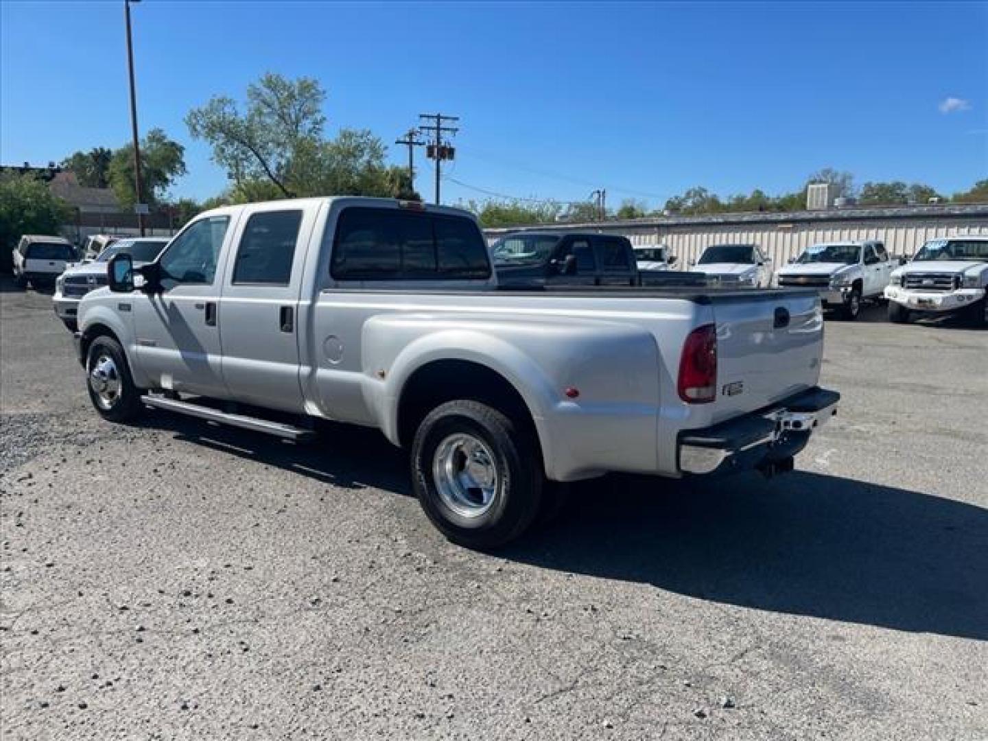 2004 Silver Clearcoat Metallic Ford F-350 Super Duty XLT (1FTWW32P24E) with an Power Stroke 6.0L Diesel Turbo V8 325hp 560ft. lbs. Other engine, 5-Speed Automatic transmission, located at 800 Riverside Ave, Roseville, CA, 95678, (916) 773-4549, 38.732265, -121.291039 - DIESEL CREW CAB DUALLY XLT LOW MILES MOON ROOF NEW TIRES NEW HIGH PRESSURE OIL PUMP NEW EGR AND OIL COOLER AUXILIARY FUEL TANK - Photo#2