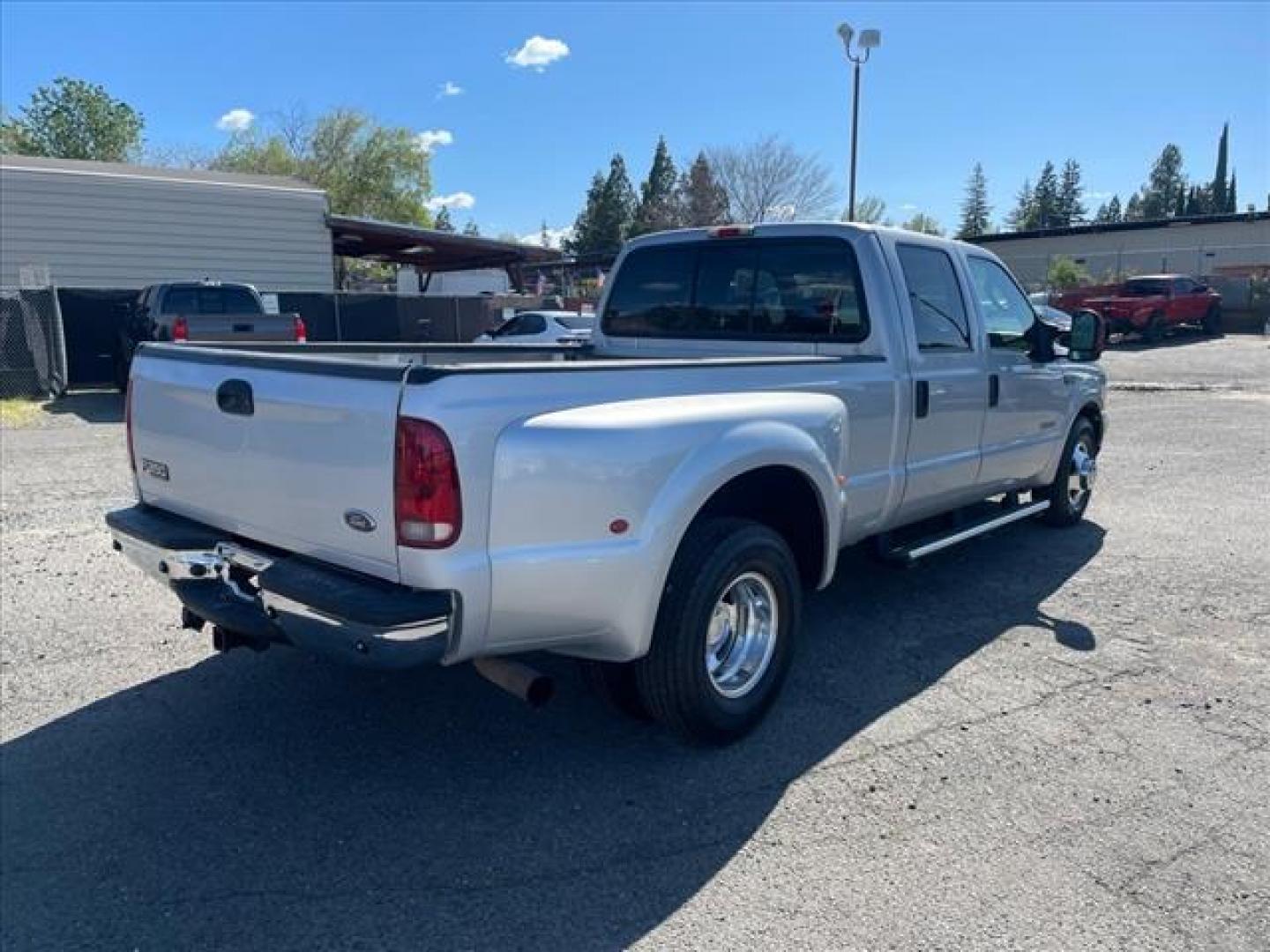 2004 Silver Clearcoat Metallic Ford F-350 Super Duty XLT (1FTWW32P24E) with an Power Stroke 6.0L Diesel Turbo V8 325hp 560ft. lbs. Other engine, 5-Speed Automatic transmission, located at 800 Riverside Ave, Roseville, CA, 95678, (916) 773-4549, 38.732265, -121.291039 - DIESEL CREW CAB DUALLY XLT LOW MILES MOON ROOF NEW TIRES NEW HIGH PRESSURE OIL PUMP NEW EGR AND OIL COOLER AUXILIARY FUEL TANK - Photo#3
